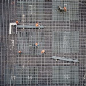 Overview shot of workers on a grid - SCR Safety Solutions