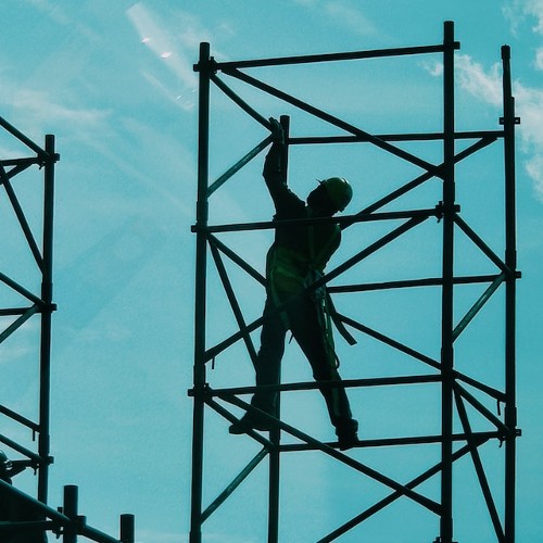 Construction Worker on Scaffolding - Silouette - SCR Safety Solutions