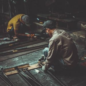 Workers in a shop - Vintage Image - SCR Safety Solutions